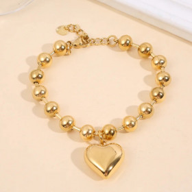 Bracelet doré à grosses perles rondes avec pendentif cœur bombé - 1