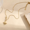 Collier doré chaîne fine pendentif étoile 8 branches strass central - 1