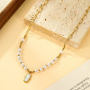 Collier Chaîne Dorée Perles Blanches et Pendentif Nacré