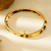 Bracelet Jonc Multi Cercle Doré et Acrylique Motif Animalier Léopard