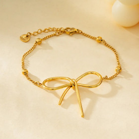 Bracelet Doré Chaîne Boules Dorées Avec Grand Nœud Papillon - 1
