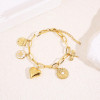 Bracelet maillons breloques cœur et libellule - 1