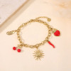 Bracelet doré breloques soleil fleur piment cœur feuille