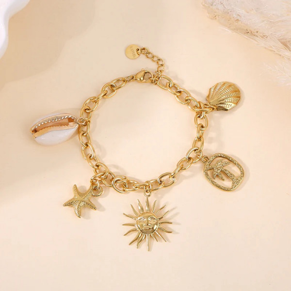 Bracelet doré breloques thème de la mer - 1