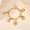Bracelet doré breloques thème de la mer - 1