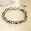 Bracelet Chaîne Argentée Maille Torsadée Plates Effet Brillant