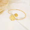 Bracelet Jonc Doré Ajustable Croisé à l’Avant avec Cercles Effet Vague
