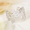 Bracelet manchette argenté style nénuphars ajourés