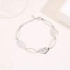 Bracelet Argenté Maillons Ovales et Médaillons Gravés Motif Feuille
