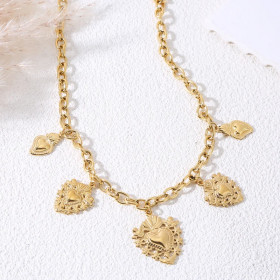 Collier doré avec breloques cœurs ex-voto - 1