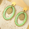 Boucles d'oreilles Pendantes Dorées Ovale Vert et Médaillon Martelé