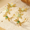 Boucles d'oreilles Créoles Dorées Triple Fleur Ajourée et Pierres Vertes - 1