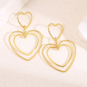 Boucles d'oreilles pendantes double cœur fins - 1