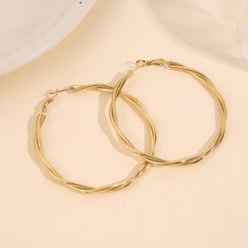 Boucles d'oreilles créoles dorées effet torsadé lisse - 1