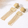 Boucles d'oreilles dorées pendantes à franges de chaînes fines