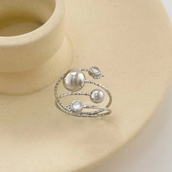 Bague Argentée Multi Anneaux Gravés Avec Strass Et Boules - 1