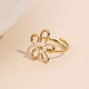 Bague ajustable dorée fleur fine avec perle