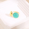 Bague dorée ajustable ouverture devant goutte avec pierre ronde bleue - 1