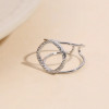 Bague argentée ajustable à double branche ajouré pavé de strass - 1