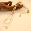 Collier Doré Double Chaîne avec Perle et Pendentif Strass