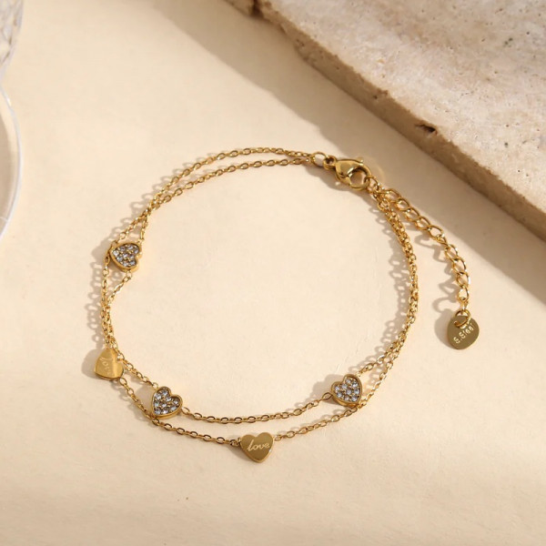 Bracelet doré double chaîne fine avec cœurs lisses gravés love ou strassés - 1