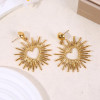 Boucles d’oreilles dorées pendantes cœur rayonnant