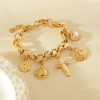 Bracelet chaîne doré pendentifs martelés croix, soleil et cœur