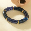 Bracelet élastique segments résine bleu et pailletée séparateurs dorés
