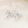 Boucles d'oreilles argentées nœud fin