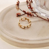 Bague dorée ajustable chaîne reliée par des liens strassés