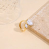 Bague dorée ouverture avant perle texturé et lisse