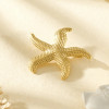Broche Étoile de Mer Dorée Martelée – Bijou Sculptural Chic Femme